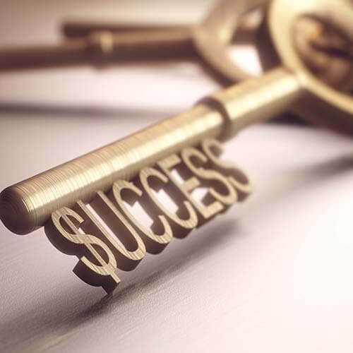 gold key with word success