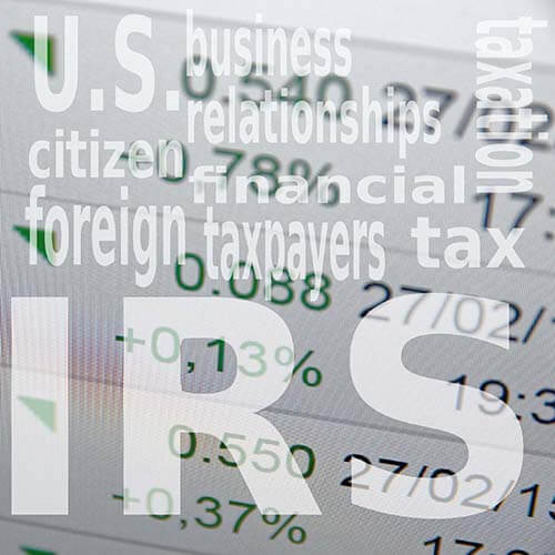 foreign tax words on background of numbers