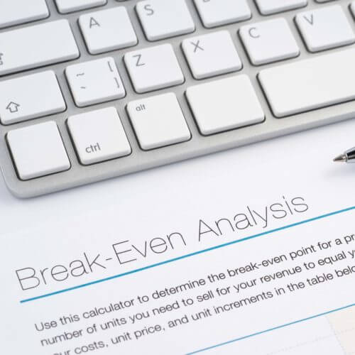 Break even analysis document and keyboard