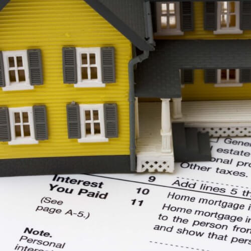 House on tax documents indicating the new tax bill impacts mortgages