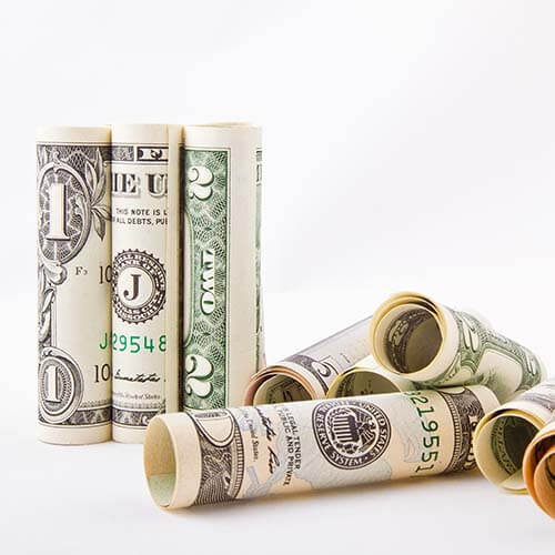 Money rolled up indicating income from interest