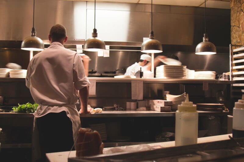 restaurant worker with restaurant equipment