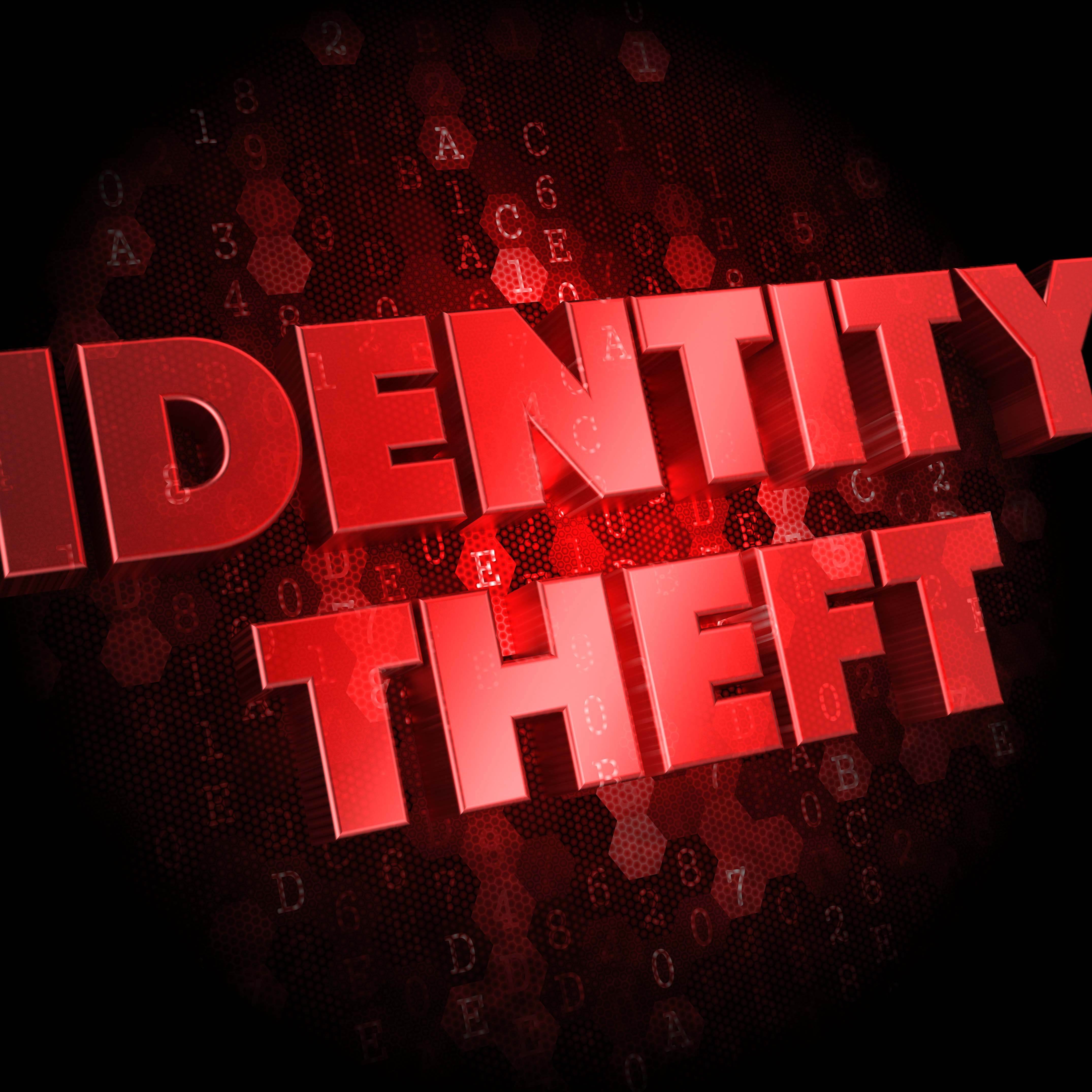 Red words Identity Theft on a digital background