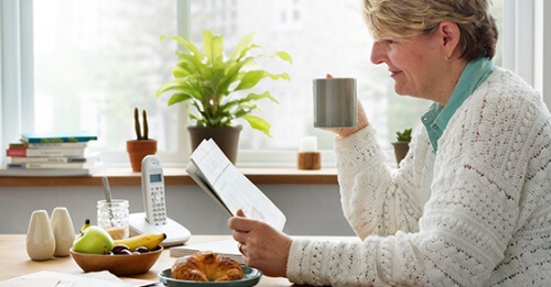 Woman drinking from a mug
