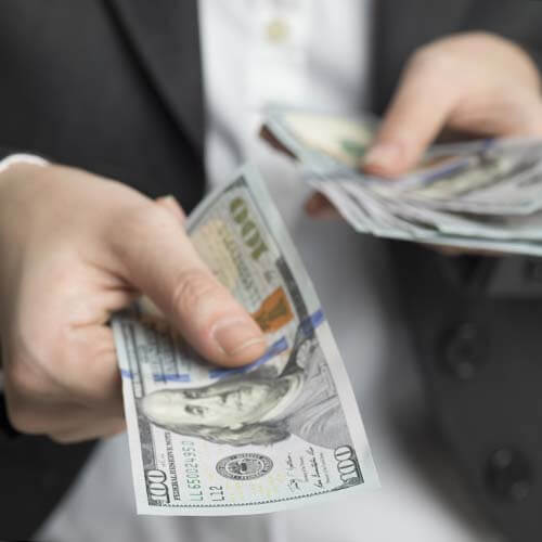 Man handing out money