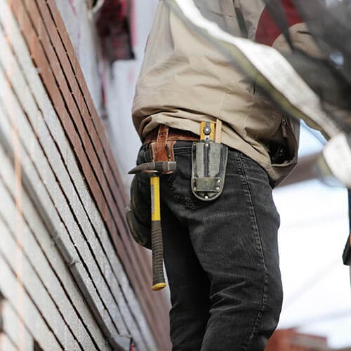 ma with tools repairing home