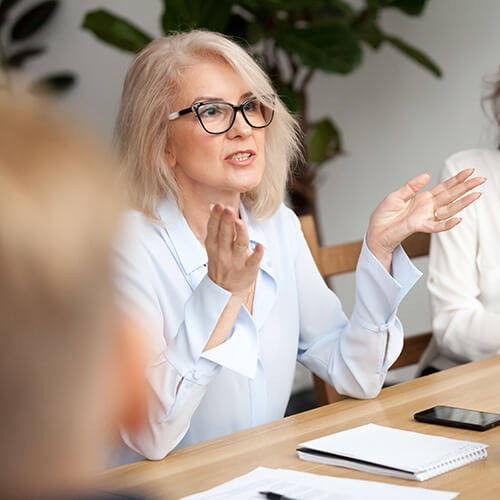 professional woman leading a leadership training session