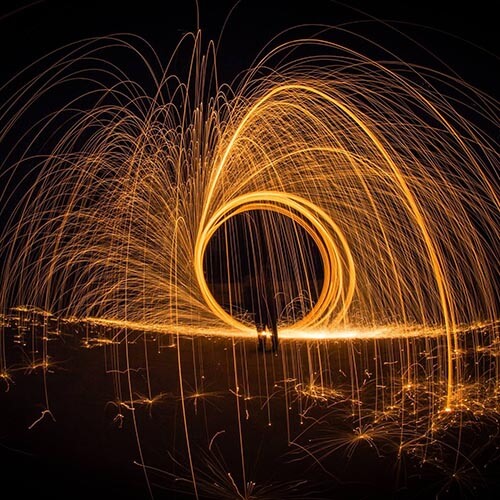 Curved orange lines on the horizon of a city