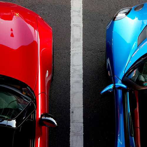Two cars in parking lot