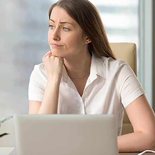 Woman in front of laptop computer