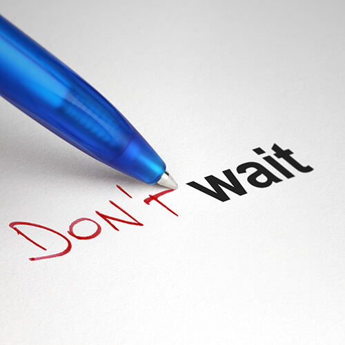 Don't Wait words written on white paper