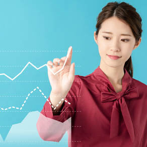 Woman with chart on wall