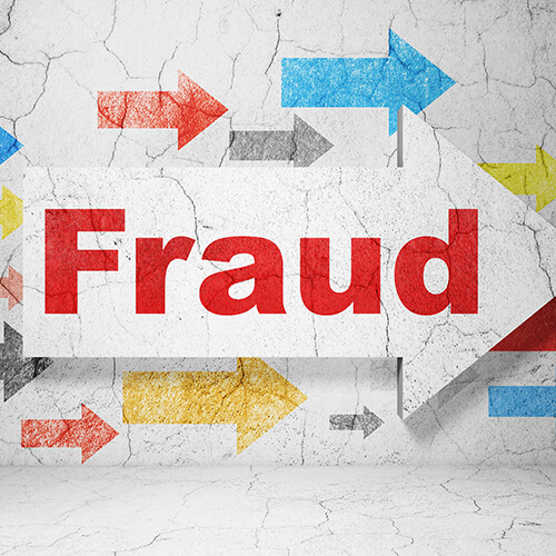 fraud in red with arrows in background