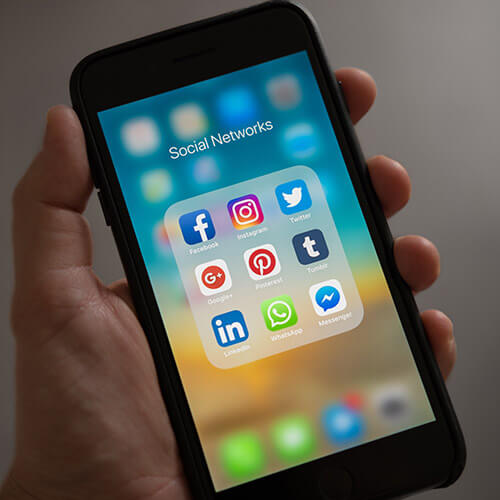 image of mobile phone with social networks