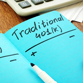 traditional 401k words on blue paper